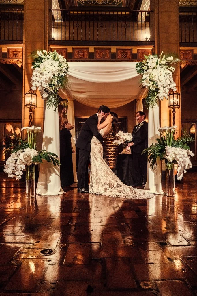Tablescape with low and tall arrangements, candles