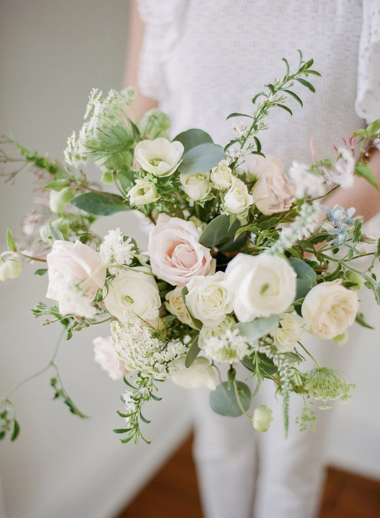 Bouquet detail with garden roses and trailing greens